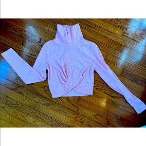 Light pink cropped turtleneck sweater